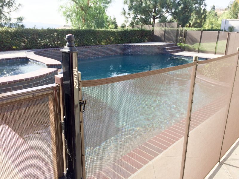 Mesh Fence Secured at Pool Entrance